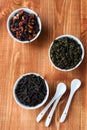 Tea composition. Assortment of dry tea green oolong, black and fruit. Selective focus. Top view