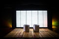 Tea concept. Japanese tea ceremony culture east beverage. Teapot and cups on table with bamboo leaves on sunset