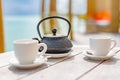 Tea concept. Japanese tea ceremony culture east beverage. Teapot and cups on wooden table Royalty Free Stock Photo