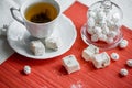 Tea cookies on wooden background. Homemade pastry concept. Composition of tiny gateau with sugar powder for tea time. Star shaped