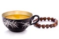 Tea cup & Bracelet Royalty Free Stock Photo