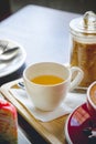 Tea cup and coffee and cake on wood table in restaurant Royalty Free Stock Photo