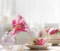 The tea cup is decorated with nicely pink flowers. Royalty Free Stock Photo