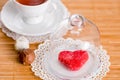 Tea cup with heart shaped biscuits. Sugar red biscuits. Royalty Free Stock Photo