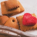 Tea cup with heart shaped biscuits. Sugar red biscuits. A square, equal sides. Instaphoto with filters