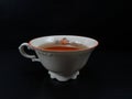 Tea cup porcelein old fashion/vintage white with black background
