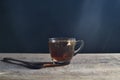 Tea cup with tea bag on old wood. Summer tea time Royalty Free Stock Photo