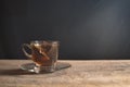 Tea cup with tea bag on old wood. Summer tea time Royalty Free Stock Photo