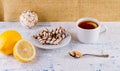 Tea in a cup and wafer tubules in a plate Royalty Free Stock Photo