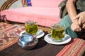 Tea cups with Coca leaves infusion known as Royalty Free Stock Photo