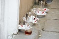 Tea cups and plates standing on the ground Royalty Free Stock Photo