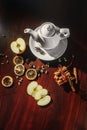 Tea cups with teapot on old wooden table