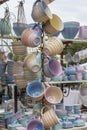 Tea cups. Tough and practical, utilitarian ware for the kitchen. Art ware, tableware, decorative ware. Fair of pottery on the city
