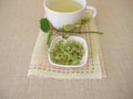 Tea with dried hop flowers Royalty Free Stock Photo