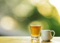 Tea drinks with on green bokeh ligths backgrounds