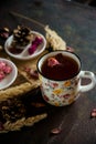 Tea with edible flowers, pansies. The concept of a cozy home autumn tea party Royalty Free Stock Photo