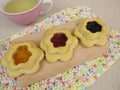 Tea and floret biscuits filled with jam
