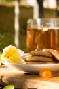 Tea with flower and biscuits boho style Royalty Free Stock Photo