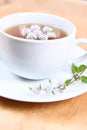 Tea with flowers of peppermint