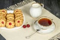 Tea fresh biscuits with cherries Royalty Free Stock Photo