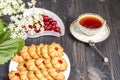 Tea fresh biscuits with cherries Royalty Free Stock Photo