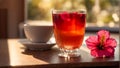 Tea in a glass cup, hibiscus flower fresh healthy beverage