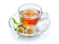 Tea in a glass cup with jasmine flowers