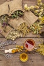 Tea with honey. Herbal harvest collection and bouquets of wild herbs. Alternative medicine. Natural pharmacy, self-care concept