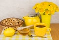 Tea with honey and lemon, bagels and bouquet Royalty Free Stock Photo