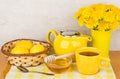 Tea with honey and lemon, bouquet of dandelions Royalty Free Stock Photo