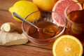 Tea with honey, lemon and ginger on wood Royalty Free Stock Photo