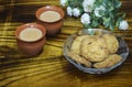 Clay Cup with Cookies in Glass Bowl