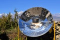 Tea kettle boiling by solar parabolic reflector