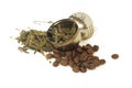 Tea leaves and coffee beans with strainer Royalty Free Stock Photo