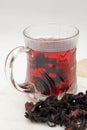 Tea made from dried hibiscus flower with tea in glass cup. Royalty Free Stock Photo