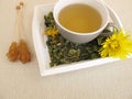 Tea with marigold and cornflower on tray Royalty Free Stock Photo