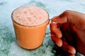 Tea with milk in a mug or popularly known as Teh Tarik. Royalty Free Stock Photo