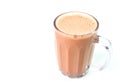 Tea with milk or popularly known as Teh Tarik over white background Royalty Free Stock Photo