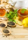 The tea with mint honey ginger and lemon on wood background,warm ton Royalty Free Stock Photo