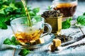 Tea. Mint Tea. Herbal tea. Mint leaf. Mint leaves. Tea in a glass cup, mint leaves, dried tea, sliced lime. herbs tea and mint lea Royalty Free Stock Photo