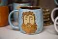 Tea mug with a picture of a man`s face
