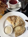 Tea and pancakes with vanilla cream Royalty Free Stock Photo