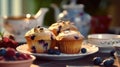 Tea party with blueberry muffins with powdered sugar and fresh berries. Generative AI