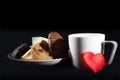 Tea cup of morning drink  waffles  biscuits and red heart on the table. Romantic breakfast Royalty Free Stock Photo