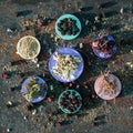 Tea party  flat lay top view with dry red hibiscus tea, Paraguay tea,dry Herb,berry of black chokeberry, flower of apple on Royalty Free Stock Photo