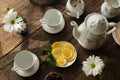 Tea party. Porcelain tea set on wooden table. Royalty Free Stock Photo