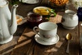 Tea party. Porcelain tea set on wooden table. Royalty Free Stock Photo