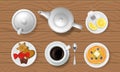 Tea party set on wooden table. Teapot, tea cup, sugar bowl, saucer, spoon, teabag, lemon, pancakes, vector illustration. Royalty Free Stock Photo