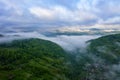 Tea Plantations at Cameron Highlands Malaysia. Sunrise in early morning with fog. Royalty Free Stock Photo