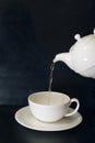 Tea pouring from china pot Royalty Free Stock Photo